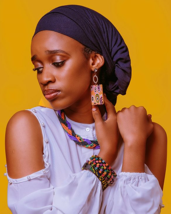 sad black woman in traditional outfit